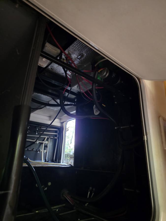 Mountain Valley Mobile RV Solutions - Tracing wiring and plumbing behind an access panel in Upstate SC