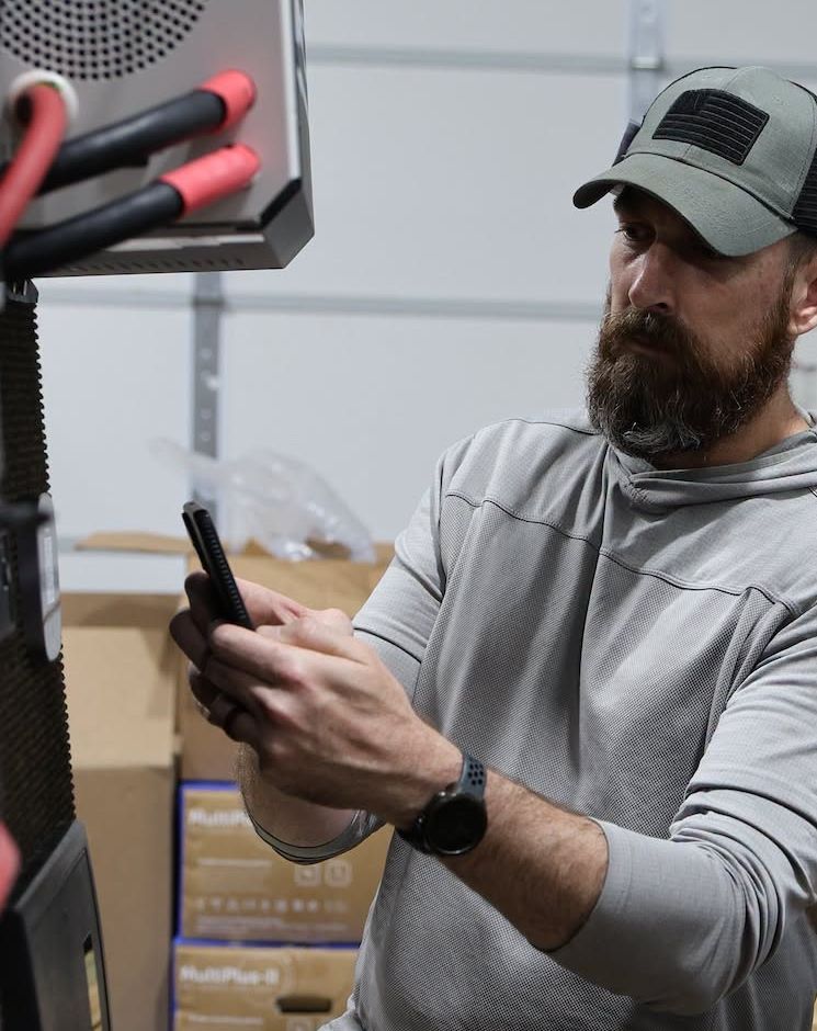 Mountain Valley Mobile RV Solutions - Shawn configuring a Victron inverter system
